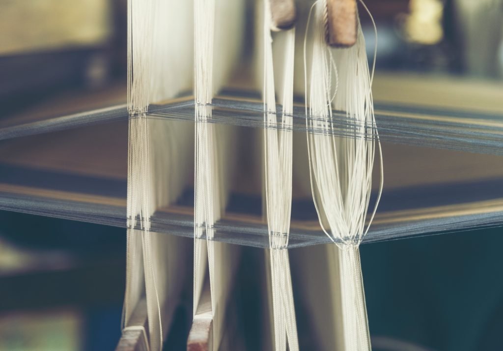 old weaving loom - closeup - photo, vintage filter image